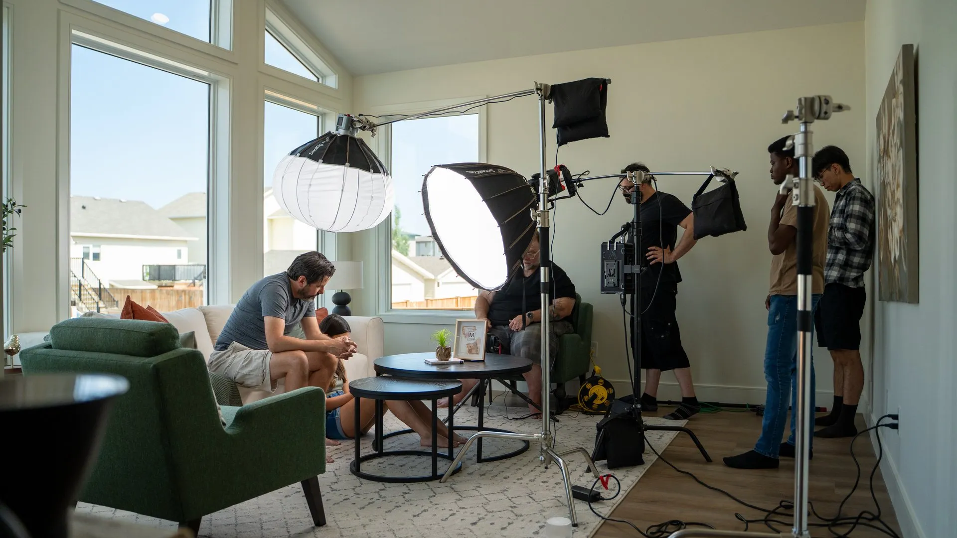 Coalbanks crew lighting an interview set on location