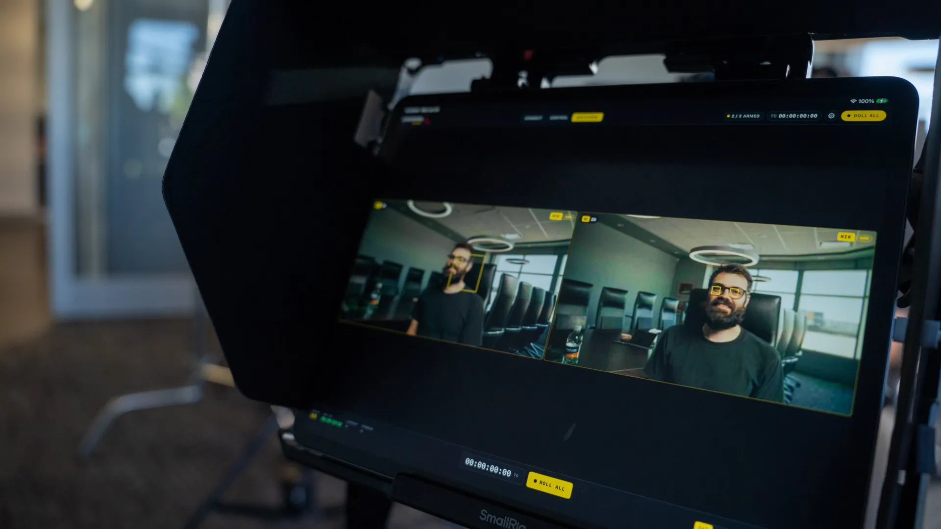 Director's monitor showing a two-camera interview frame